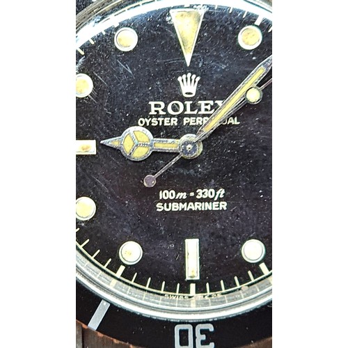 1004 - ROLEX - a Vintage stainless steel Oyster Perpetual Submariner 'James Bond' automatic bracelet watch,... 