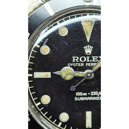 1004 - ROLEX - a Vintage stainless steel Oyster Perpetual Submariner 'James Bond' automatic bracelet watch,... 