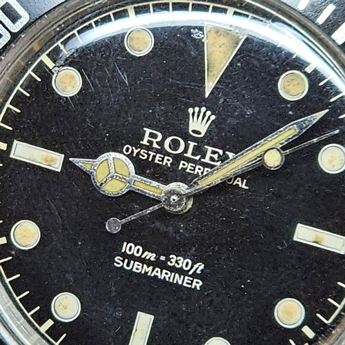 1004 - ROLEX - a Vintage stainless steel Oyster Perpetual Submariner 'James Bond' automatic bracelet watch,... 