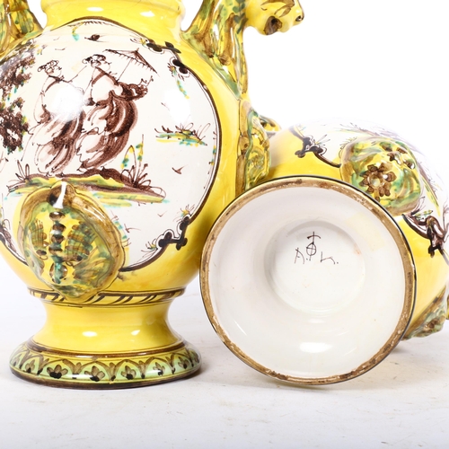 119 - A pair of early 19th century Italian Maiolica jars, decorated with manganese yellow and copper green... 