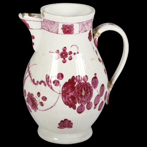 120 - 19th century purple and white Delft Ware jug, H20cm