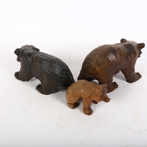 124 - 3 Black Forest carved bears, largest width 21cm