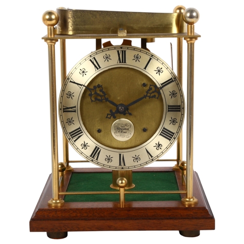 126 - A spheroid weight clock, limited edition no. 472 of 1000, retailed by Thwaites & Reed Ltd, clock hei... 