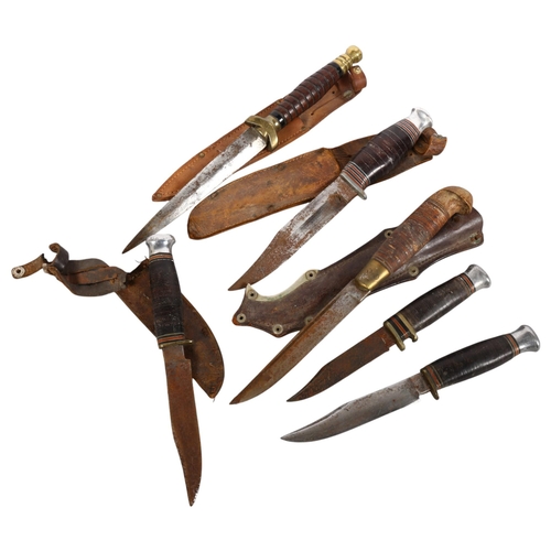 134 - A collection of various hunting and military knives, makers to include G Johnson Sheffield England (... 