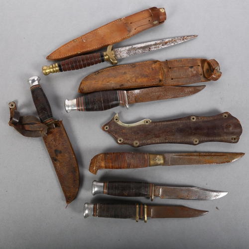 134 - A collection of various hunting and military knives, makers to include G Johnson Sheffield England (... 