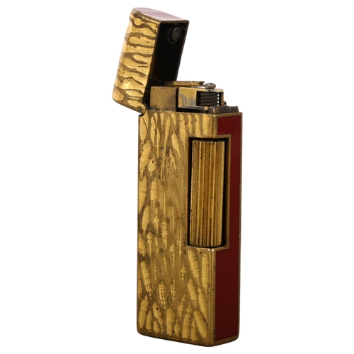 154 - A Vintage Dunhill two-tone lighter with textured body, impressed US.RE 24163 to the underside