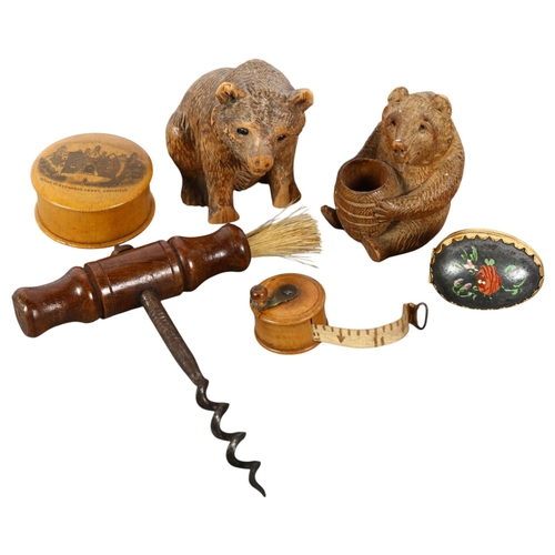 158 - A group of interesting items, to include a miniature boxwood fishing reel design tape measure, a Mau... 