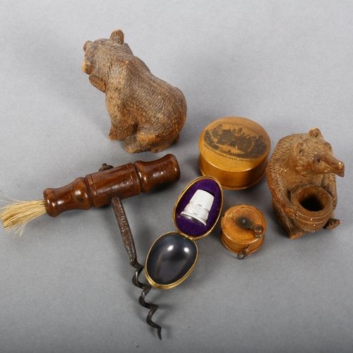 158 - A group of interesting items, to include a miniature boxwood fishing reel design tape measure, a Mau... 