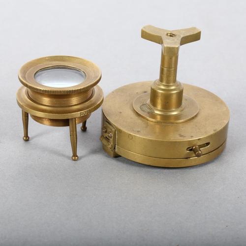 159 - Stanley London, a brass-cased compass, and a brass map reading lens on stand by Ross of London