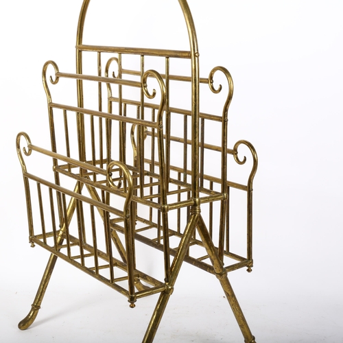 16 - An Antique brass 4-section magazine rack, overall height 76cm, width 41cm