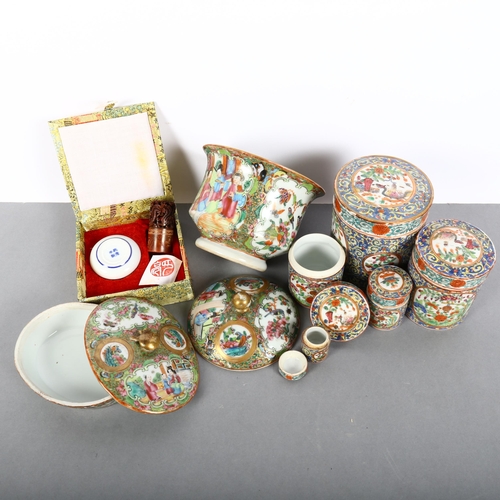 187 - A Chinese famille rose Canton oval dish and cover, a pot and cover, a cased seal set, and a set of s... 