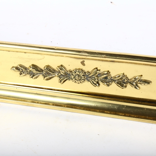 20 - An Antique pierced brass fender with applied floral decoration, L93cm, D23.5cm, inner length 87cm, i... 