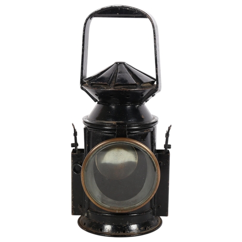 211 - C EASTGATE & SON LTD - a Second World War Period issue railway lamp, black painted with applied plaq... 