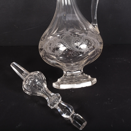 217 - A large glass acid etched and facet cut Claret jug, with matching stopper, H46cm