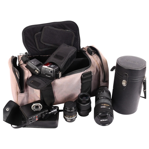 236 - A group of various Nikon lenses and flashes, including a Nikon 80-200mm F/2.8 lens, a 55mm F/2.8 mic... 