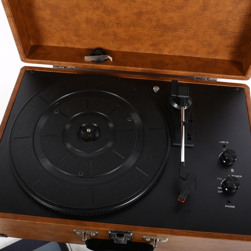 248 - A Bauhn Vintage suitcase turntable, model no. UBST-0657, with instruction manual and power cable