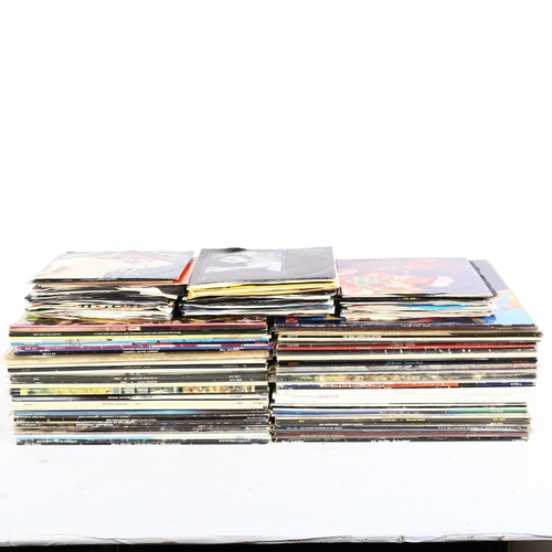 250 - A large collection of vinyl LPs and 7