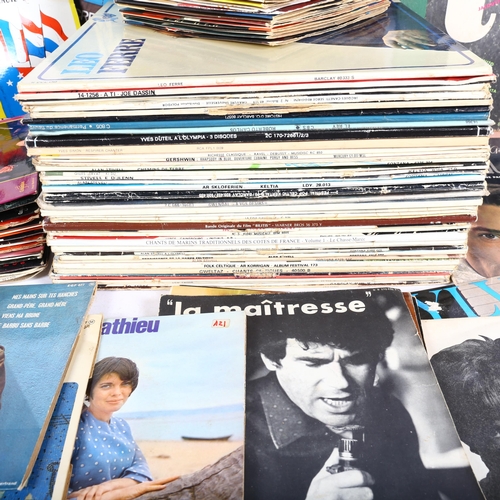 251 - A large quantity of vinyl records, both LPs and 7