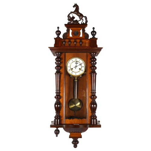 300 - An ornate walnut-cased Vienna regulator wall clock, with carved horse mounted decoration, height app... 