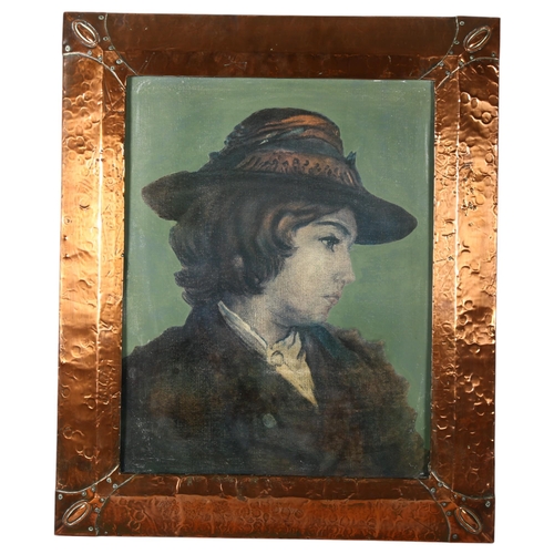 312 - An Arts and Crafts hand hammered copper picture frame, frame includes printed portrait of a gentlewo... 