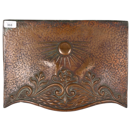 368 - A copper Arts and Crafts style fire mount, decorated with sunrise and floral scene, 30cm x 40cm x 16... 