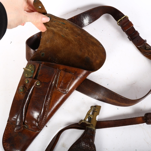 39 - An Antique brown leather brass-mounted holster and belt, the holster having 3 crowns impressed upon ... 