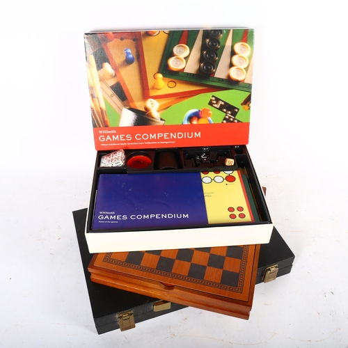 410 - A pewter chess set, King height 5cm, in games board box, cased back gammon set, and a compendium of ... 