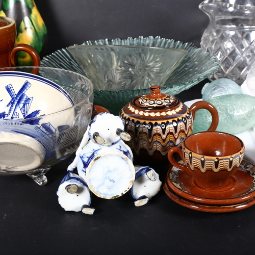 412 - Various decorative china and glassware, and a tablecloth