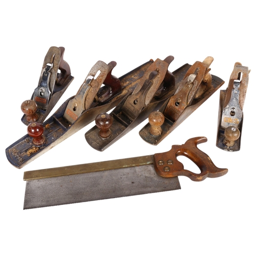 414 - A box of carpenter's woodworking planes, including Record No. 5, No. 4, and No. 7, and a saw by J Bu... 