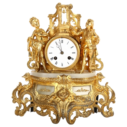 447 - A Vintage gilt-metal cased ornate mantel clock, in French style with figure supports, H32cm (lacking... 