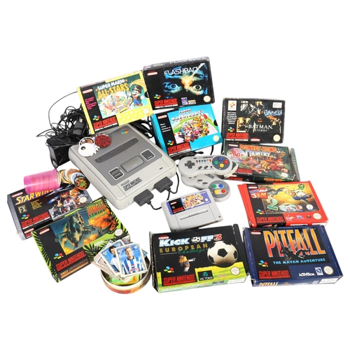 455 - A box of Super Nintendo games, etc