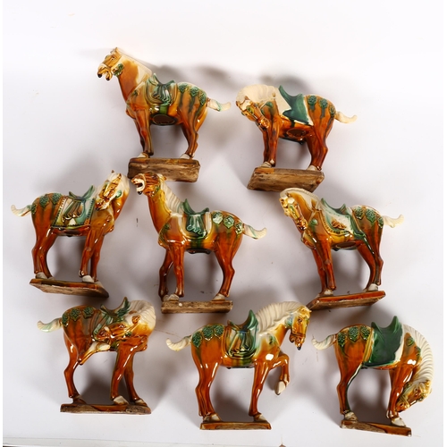 471 - A set of 8 painted pottery Chinese Tang style horses, tallest 20cm