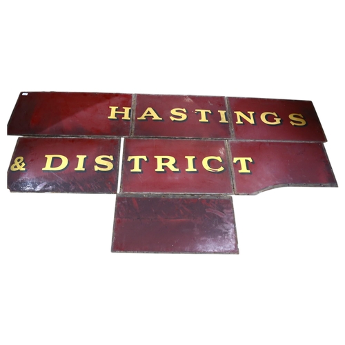 478 - A long painted and gilded sign on board, in 7-sections, 