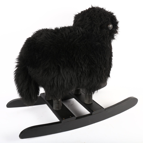 491 - A Scandinavian rocking black sheep, H55cm, made with real wool