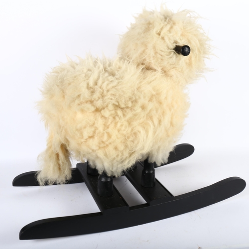 492 - A Scandinavian rocking sheep, H55cm, made with real white wool