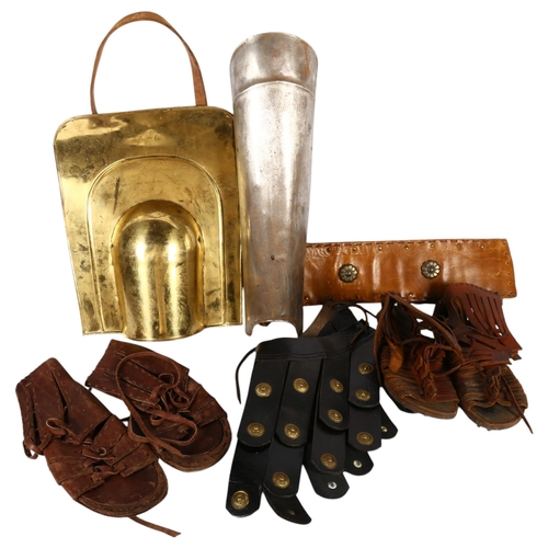 494 - A re-enactment helmet with visor, leather sandals, leather belt, etc