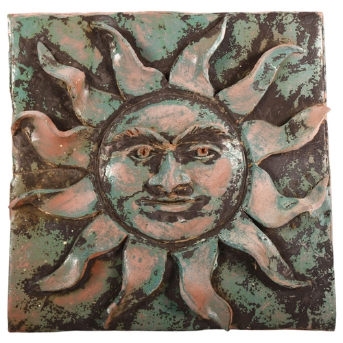 516 - A Vintage terracotta sunburst zodiac style terracotta wall plaque, unsigned, 30cm x 30cm