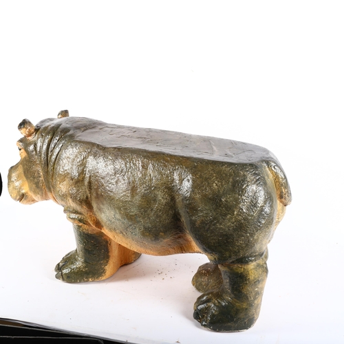 519 - Clive Fredriksson - A composition painted figure of a hippopotamus, as a side table or stool, L77cm