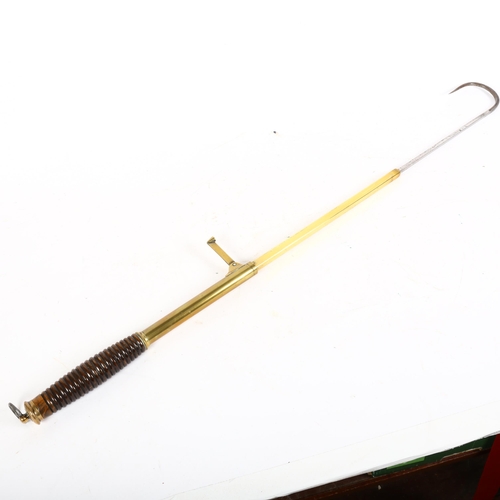 55 - An Antique brass and turned wood handled telescopic salmon fishing gaff