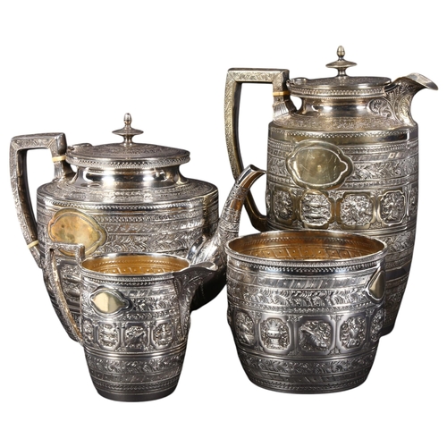 551 - An ornate silver plated 4-piece tea set in Anglo-Indian Colonial style, allover repousse decoration,... 