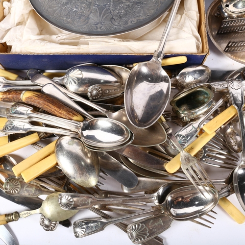 573 - A large quantity of silver plated cutlery, asparagus dish and tongs, muffin dish and cover, etc (box... 