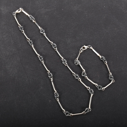 591 - A Danish oxidised sterling silver fancy link chain necklace and bracelet set, 40cm and 18cm, 21.9g t... 