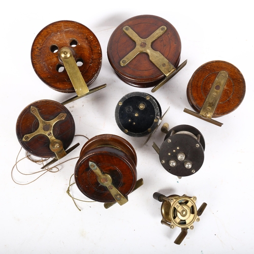 70 - A group of Vintage fishing reels, including brass star back, a 1.5