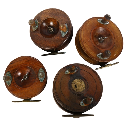 82 - 4 various Vintage teak fishing reels, including a brass star back example, largest 5.5