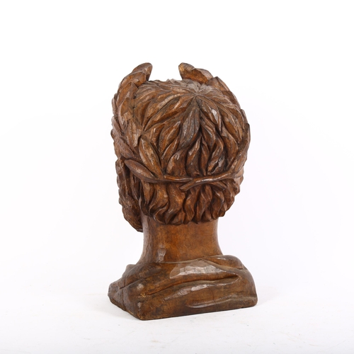 9 - A 19th century walnut carved bust of a Roman Emperor with laurel wreath, H36cm