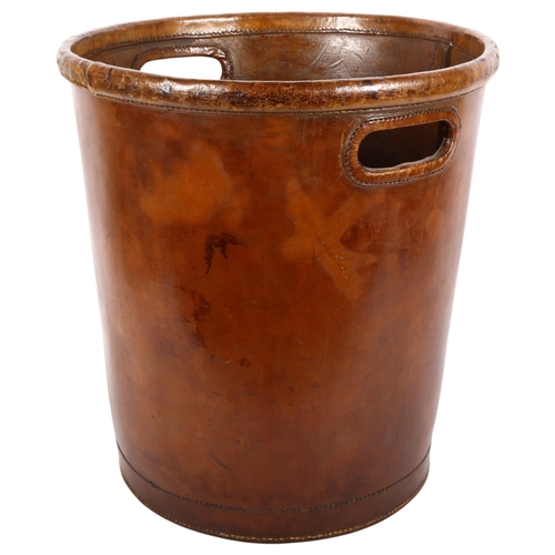 91 - A large stitched leather 2-handled waste paper basket, H42cm