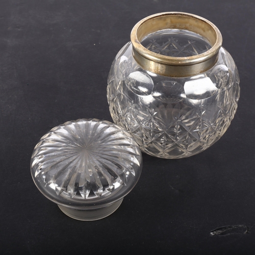 609 - A cut-glass and silver collared jar and cover, H12cm