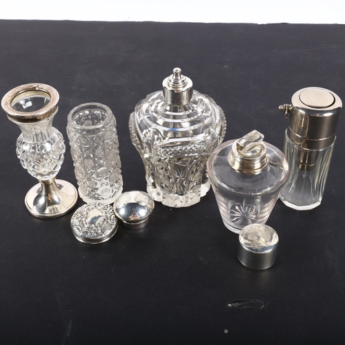 610 - A group of various glass and silver-mounted scent bottles, and small bud vase (4)