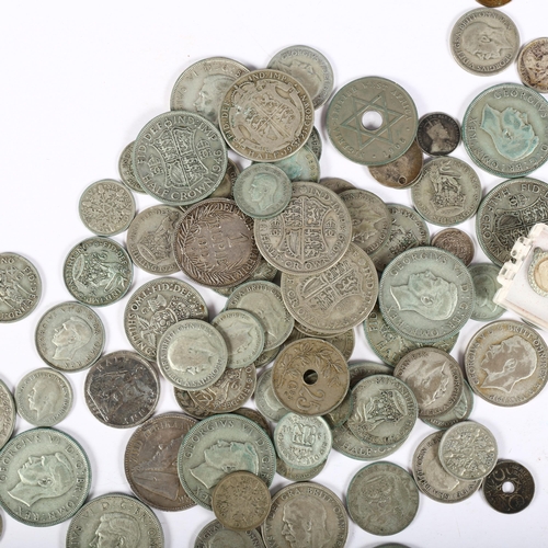 615 - A quantity of pre-1946 mainly English silver coins, and a silver St Christopher