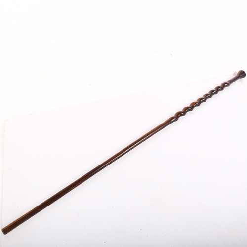 640 - A lignum vitae walking cane, with carved spiral twist to upper part